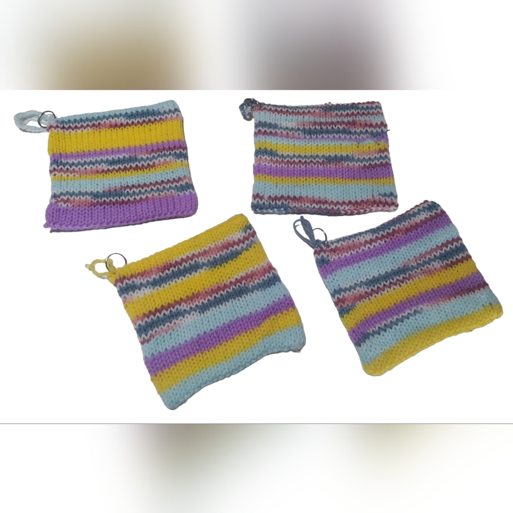 Knit Hot Pot Trivets. Set of 4. Bright yellow, pink, blue and purple.